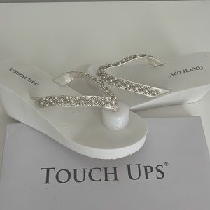 Touch Ups wedge flip flops. White size 7. Never worn